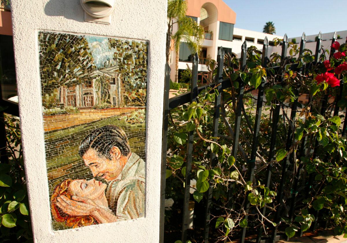 A mosaic depicting a scene from the film "Gone with the Wind" is shown on fencing surrounding the offices of the Alliance of Motion Picture and Television Producers in Encino, Calif., in an Oct. 30, 2007, file photograph. (Fred Prouser/Reuters)