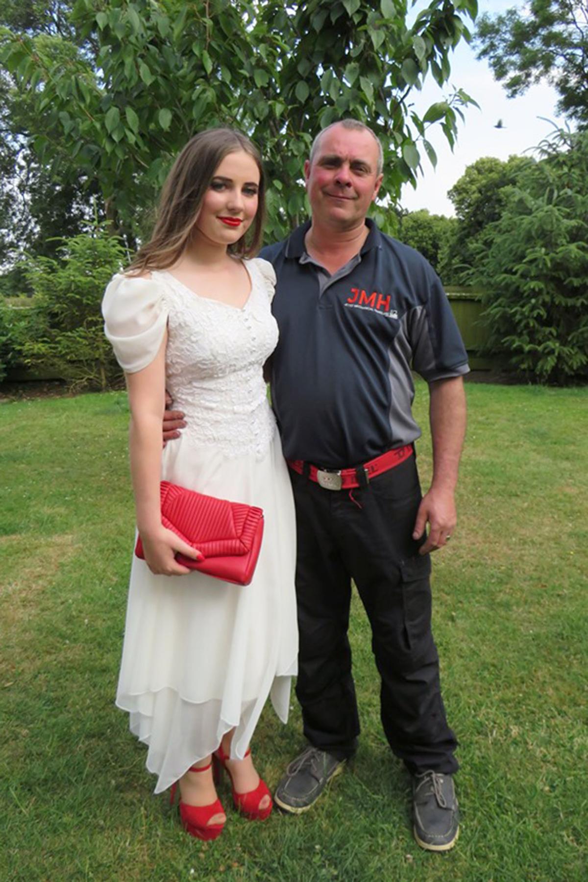 Grace with her dad, David. (Caters News)