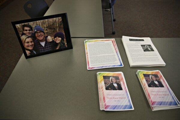 Photos, articles, and letters are laid out on display before a ceremony honoring Tessa Majors at St. Anne's Belfield School in Charlottesville, Va., on Dec. 21, 2019. (Erin Edgerton/The Daily Progress via AP)