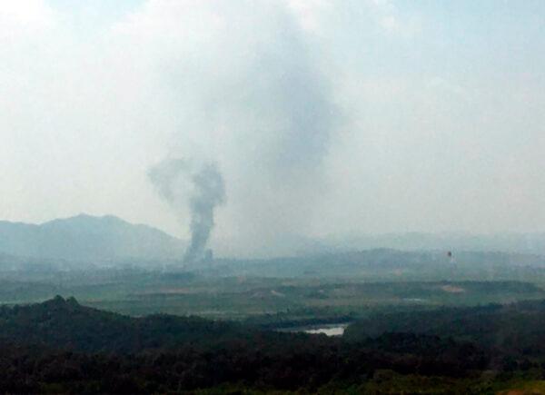 Smoke rises in the North Korean border town of Kaesong, seen from Paju, South Korea, on June 16, 2020. (Yonhap via AP)