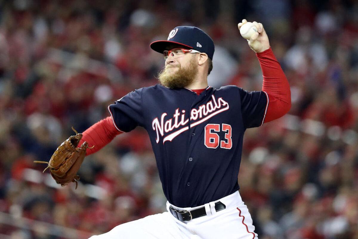 Sean Doolittle #63 of the Washington Nationals delivers the pitch against the Houston Astros during the seventh inning in Game Five of the 2019 World Series at Nationals Park in Washington on Oct. 27, 2019. (Rob Carr/Getty Images)