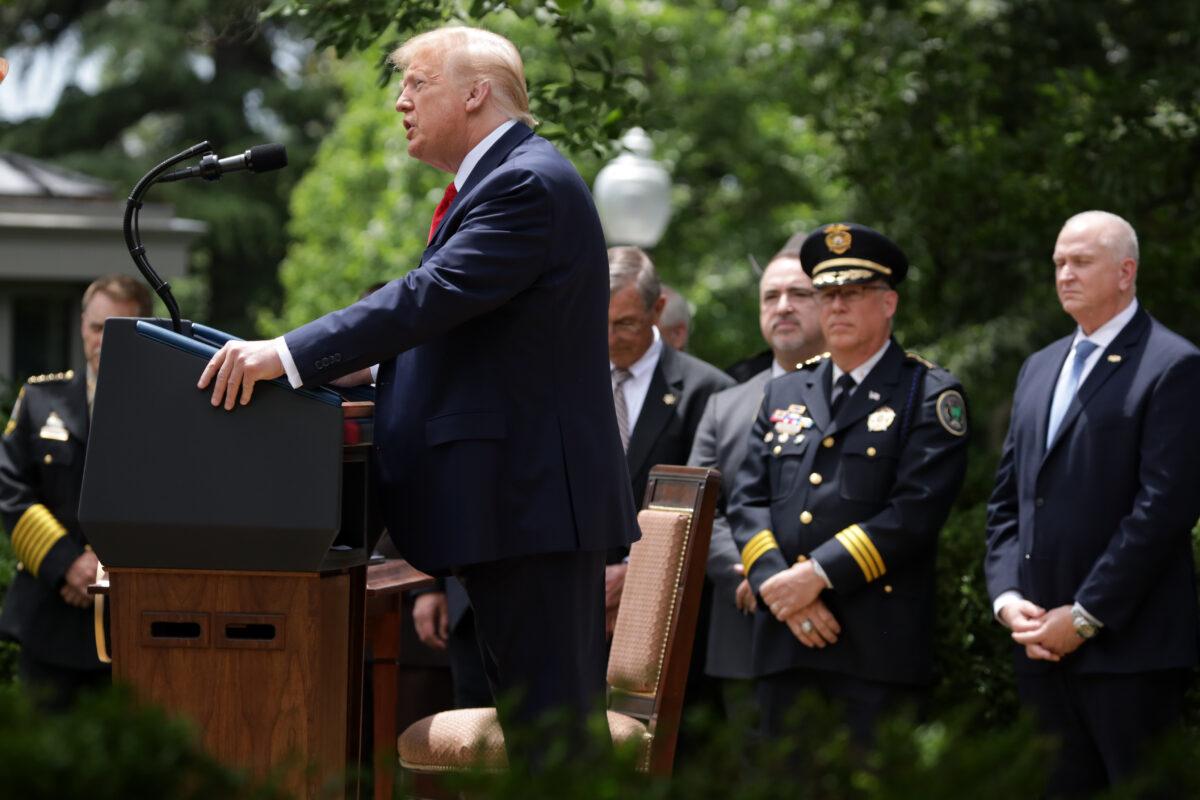 President Donald Trump speaks as members of law enforcement look on during an event in the Rose Garden on “Safe Policing for Safe Communities” at the White House in Washington on June 16, 2020. (Alex Wong/Getty Images)