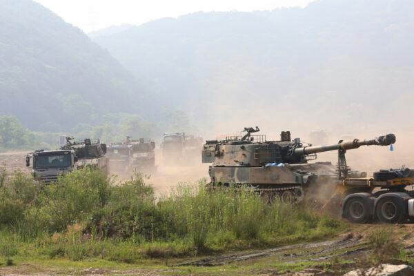 South Korean army's K-55 self-propelled howitzers loading on vehicles are moved in Paju, South Korea near the border with North Korea, on June 17, 2020. (Ahn Young-joon/AP Photo)