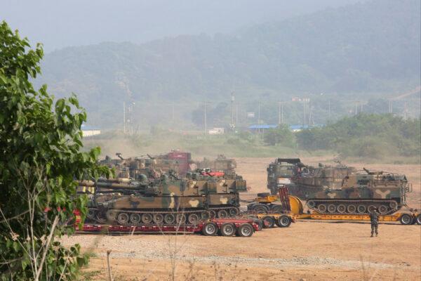 South Korean army's K-55 self-propelled howitzers are loaded on vehicles in Paju, South Korea near the border with North Korea, on June 17, 2020. (Ahn Young-joon/AP Photo)