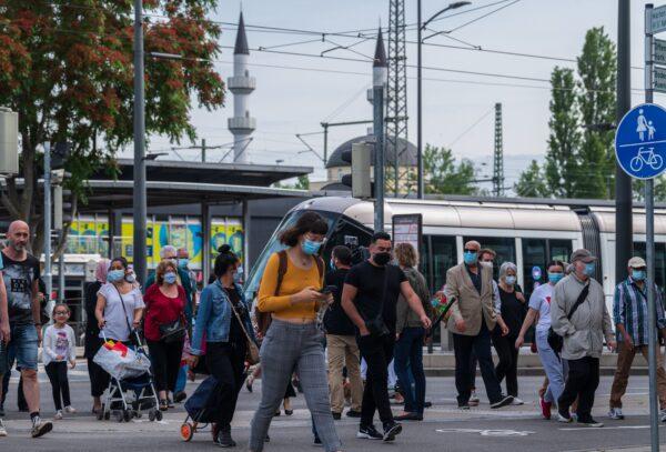 French passengers step out of the tram at a station in Kehl, on June 15, 2020, on the reopening day of the borders between France and Germany, (Patrick Hertzog/AFP via Getty Images)