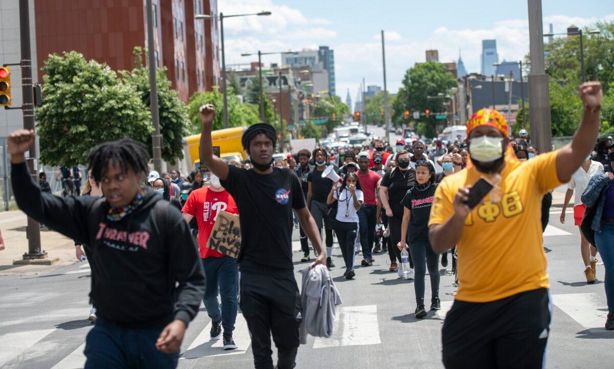 Protesters march in the aftermath of widespread unrest following the death of George Floyd, in Philadelphia, Penn., on June 1, 2020. (Mark Makela/Getty Images)
