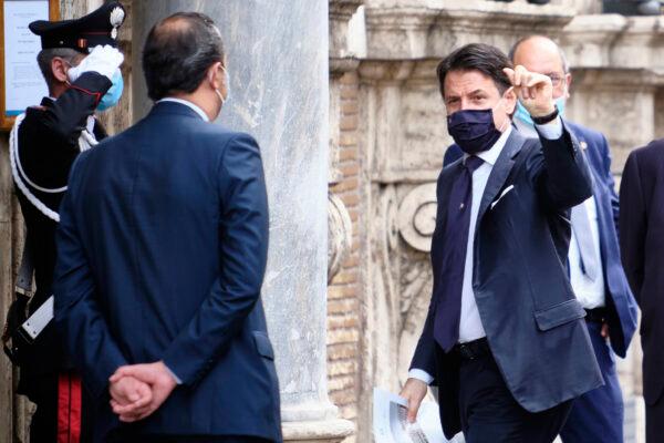 Prime minister Giuseppe Conte wears a face mask to prevent the spread of the CCP virus as he arrives to address parliament on the next European Council meeting, in Rome, Italy, on June 17, 2020. (Mauro Scrobogna/LaPresse/AP)