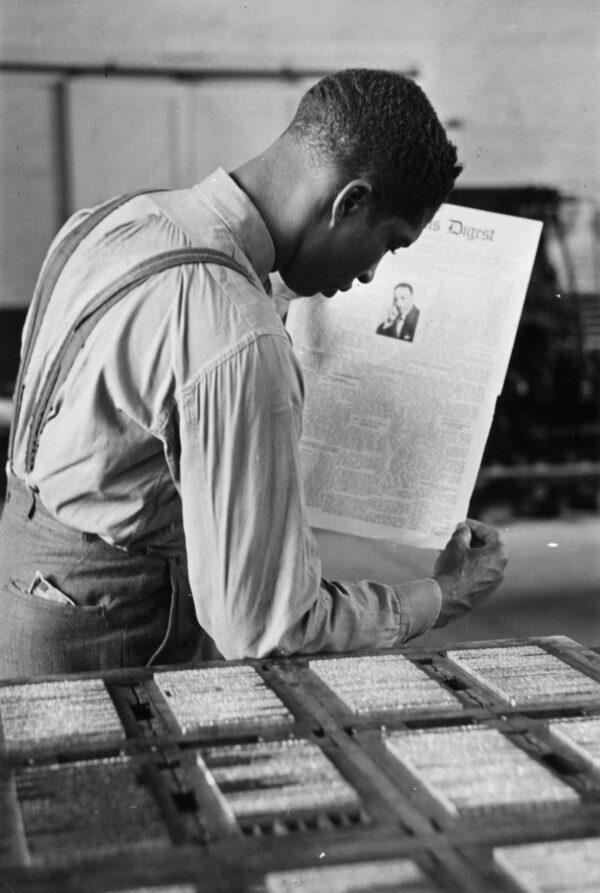 A student at Tuskegee University in Alabama, circa 1955, learns to print a newspaper page in the institute's printing works. (Bernd Lohse/Three Lions/Getty Images)