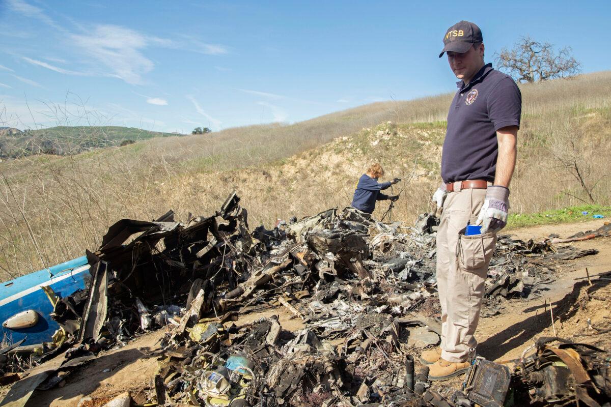 Investigators work at the scene of the helicopter crash that killed nine people, including former NBA star Kobe Bryant, in Calabasas, Calif., on Jan. 27, 2020. (James Anderson/National Transportation Safety Board/Getty Images)