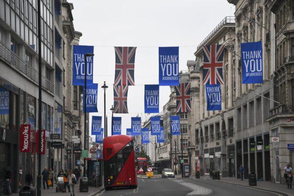 Union flags and support messages are seen in Oxford Street, ahead of the reopening of the non-essential businesses as some of the CCP virus lockdown measures are eased, in London on June 12, 2020. (Alberto Pezzali/AP Photo)