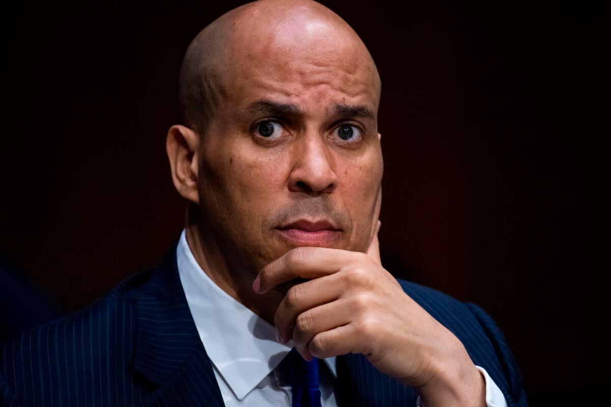 Sen. Cory Booker (D-N.J.) listens during a hearing in Washington on June 16, 2020. (Tom Williams/Pool/AFP via Getty Images)