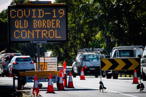 Vehicle checkpoint on the Pacific Highway on the Queensland-New South Wales border in Brisbane on April 15, 2020. (Patrick Hamilton /AFP via Getty Images)