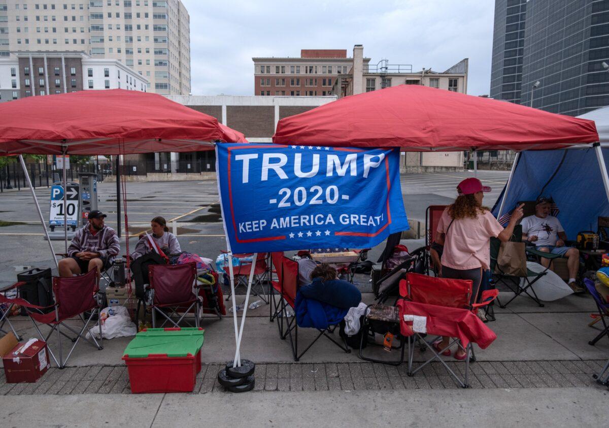 Supporters of President Donald Trump camp near the BOK Center in Tulsa, Okla., on June 19, 2020. (Seth Herald/AFP via Getty Images)