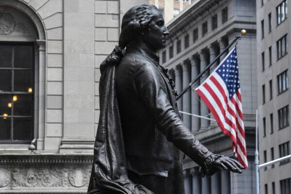 A statue of George Washington is seen near the New York Stock Exchange building along Wall Street in New York City on Aug. 1, 2018. (Stephanie Keith/Getty Images)
