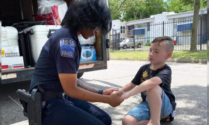 7-Year-Old Boy Prays With Local Police Officers Amid Protests, His ‘Mission’ Goes Viral