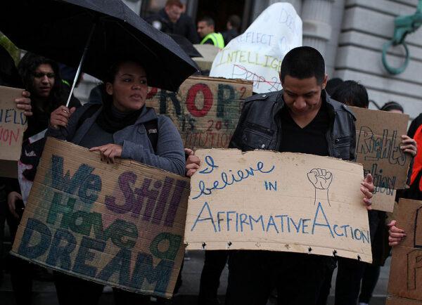 Students hoping for a repeal of California's Proposition 209 hold signs outside of the U.S. 9th Circuit Court of Appeals in San Francisco, on Feb. 13, 2012. (Justin Sullivan/Getty Images)
