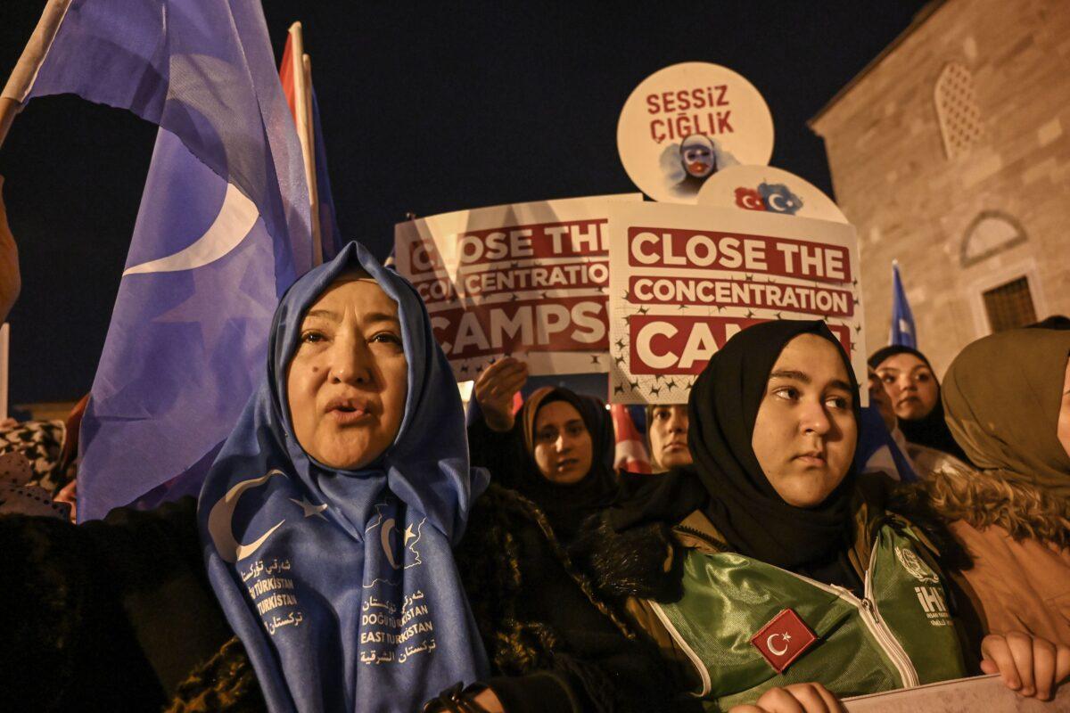 Supporters of China's Muslim Uyghur minority wave the flag of East Turkestan and hold placards in Istanbul, Turkey, on Dec. 20, 2019. (Ozan Kose/AFP via Getty Images)