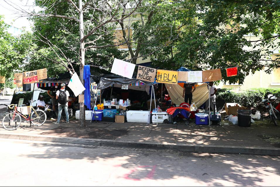 Tents line the sidewalk just before police clear H Street and Black Lives Matter Plaza after protesters set up an autonomous zone the previous night, just north of the White House in Washington on June 23, 2020. (Charlotte Cuthbertson/The Epoch Times)