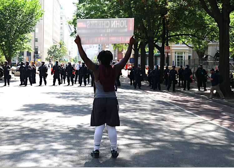 Police clear H Street and Black Lives Matter Plaza after protesters set up an autonomous zone the previous night, just north of the White House in Washington on June 23, 2020. (Charlotte Cuthbertson/The Epoch Times)