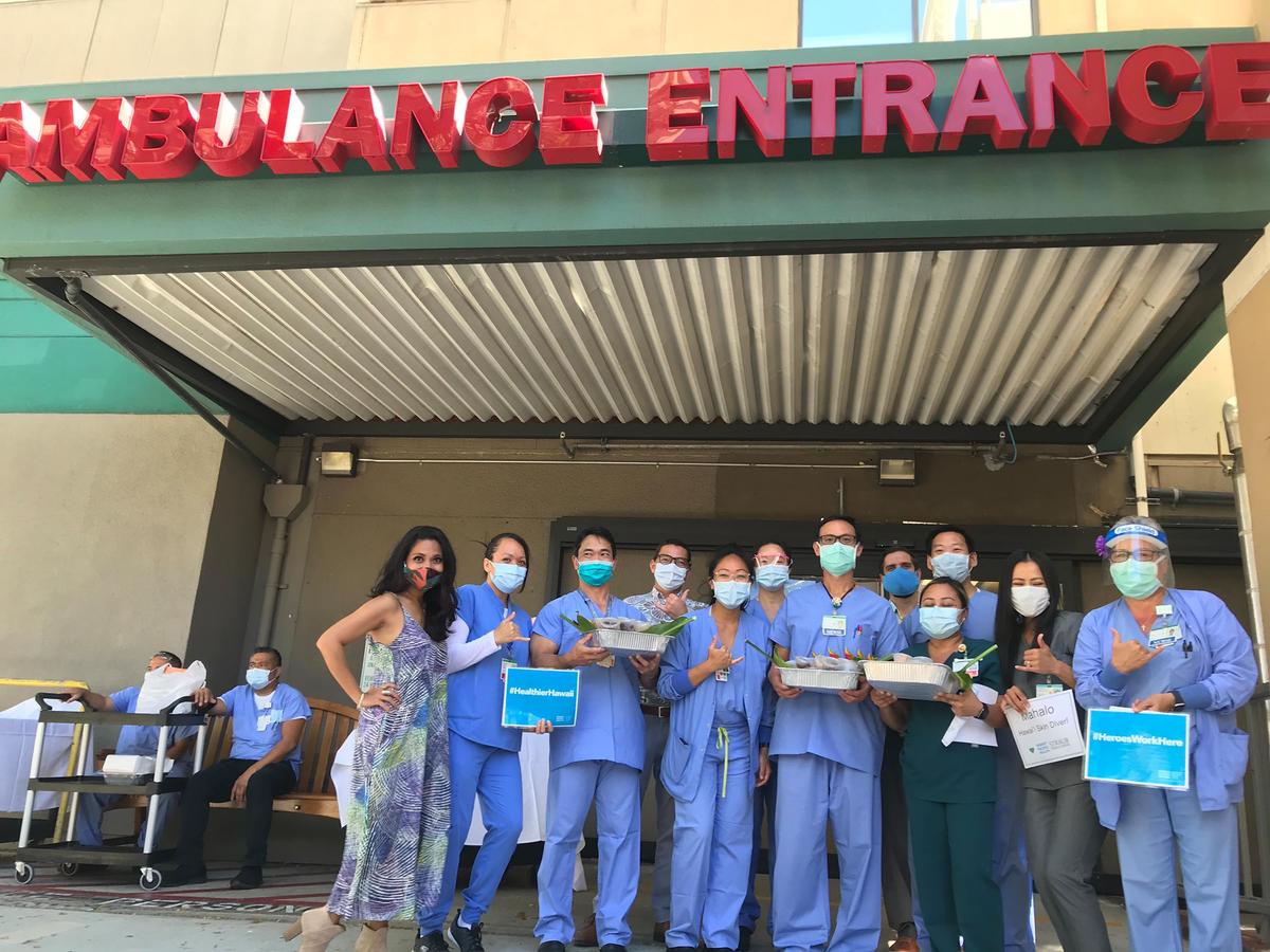 Health care workers at the Straub Medical Center with the donated tuna poke bowls. (Courtesy of Red Sea Ocean Adventures)