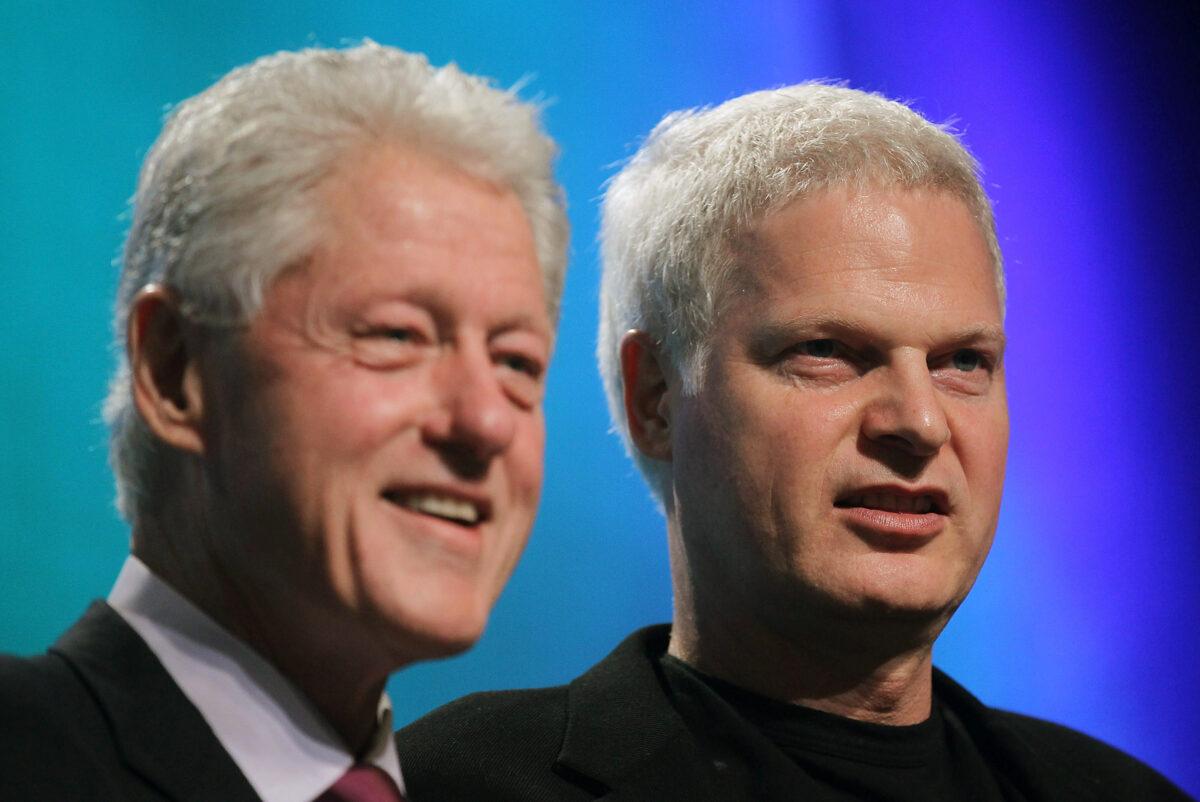 Former U.S. President Bill Clinton (L) and Hollywood mogul Steve Bing look on during the annual Clinton Global Initiative (CGI) in New York City on Sept. 21, 2010. (Mario Tama/Getty Images)