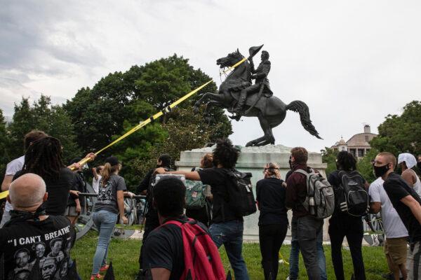 Vandals attempt to pull down the statue of Andrew Jackson in Lafayette Square near the White House in Washington, on June 22, 2020. (Tasos Katopodis/Getty Images)