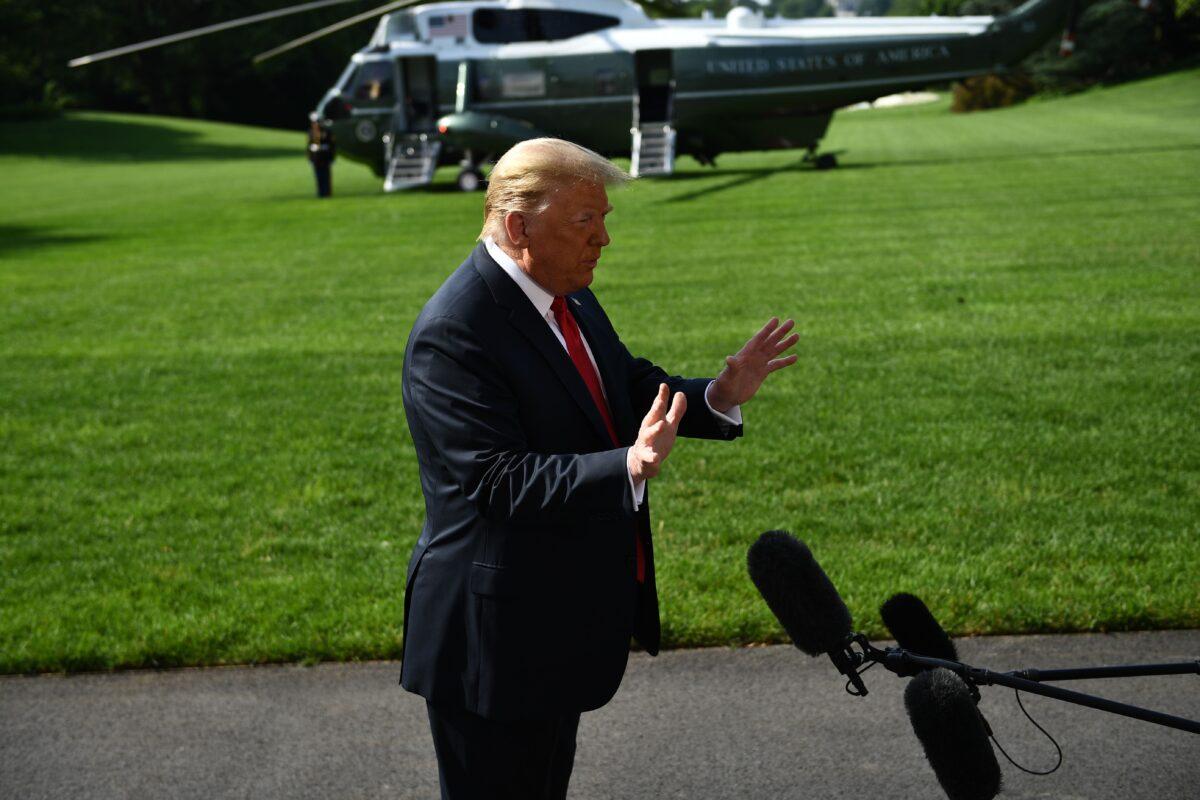 President Donald Trump speaks to the media on the South Lawn of the White House before departing, en route to Arizona, in Washington on June 23, 2020. (Brendan Smialowski/AFP via Getty Images)