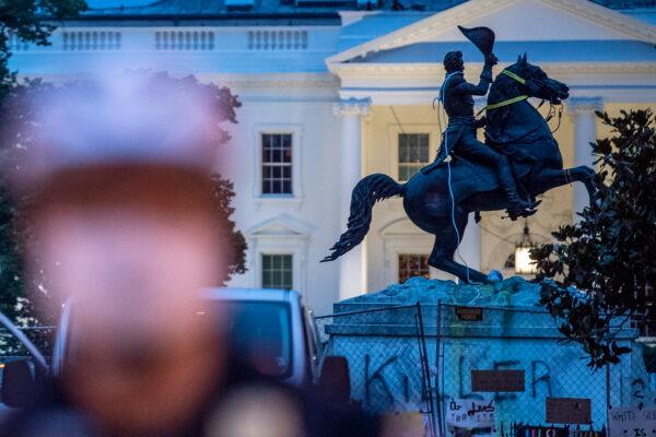 The equestrian statue of former U.S. President General Andrew Jackson has ropes and chains still hanging after protesters tried to topple it, at Lafayette square in front of the White House, in Washington on June 22, 2020. (Eris Baradat/AFP via Getty Images)