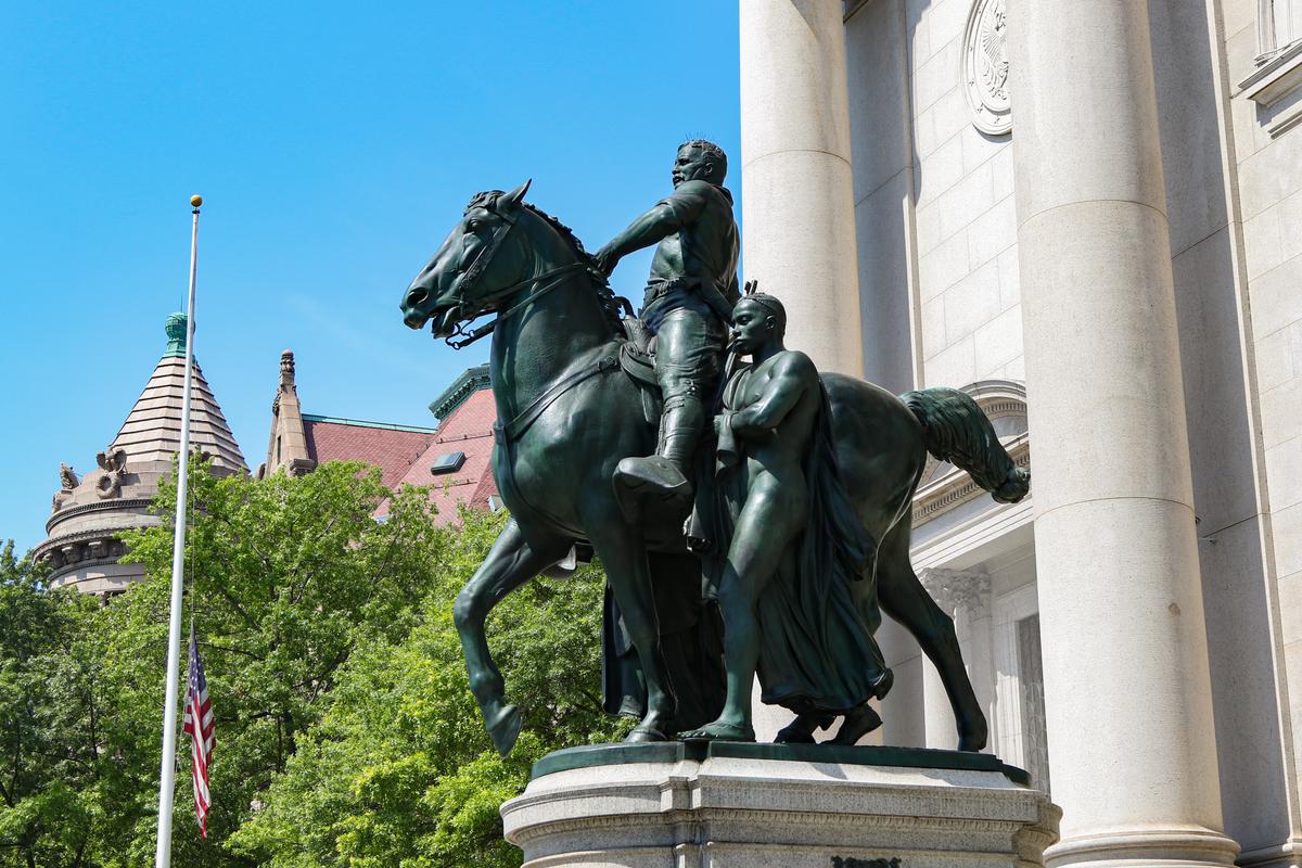 The statue of Theodore Roosevelt located in front of the American Museum of Natural History in New York on June 23, 2020. (Chung I Ho/The Epoch Times)