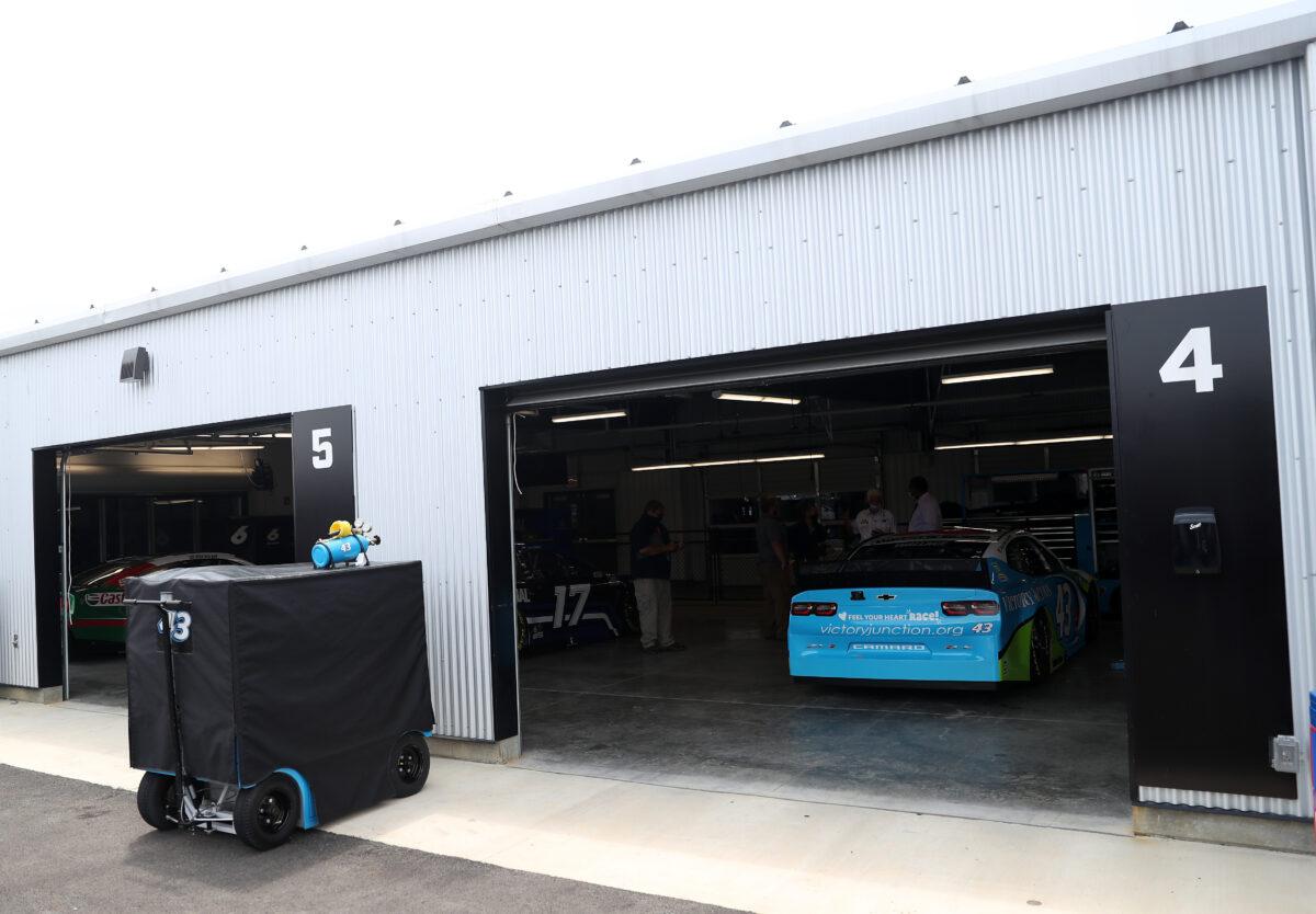 The #43 Victory Junction Chevrolet, driven by Bubba Wallace, waits in garage #4 at Talladega Superspeedway in Talladega, Ala., on June 22, 2020. The pull rope of Wallace's garage appears to be cut off when compared to the pull from the adjoining garage. (Chris Graythen/Getty Images)