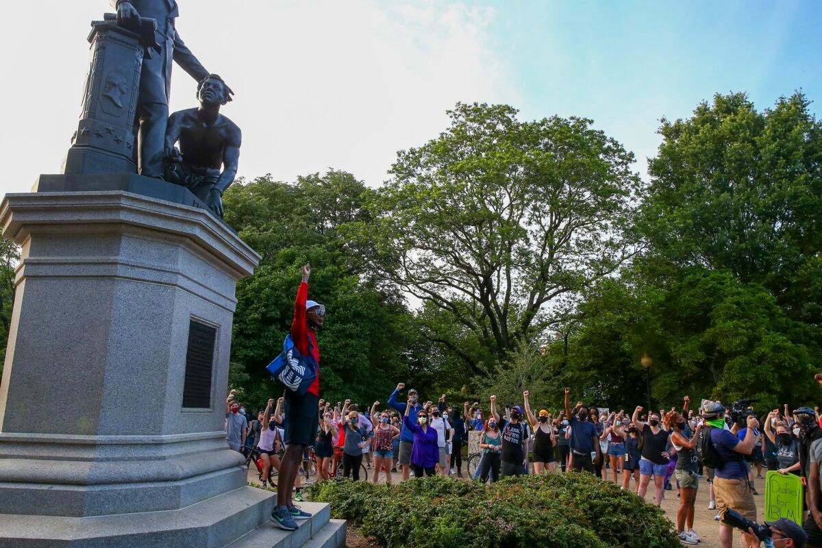 Protesters gather at Lincoln Park to demand the Emancipation Memorial be taken down in Washington on June 23, 2020. (Tasos Katopodis/Getty Images)