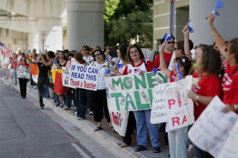 Miami-Dade County school teachers protest for higher wages in Miami, Florida, on Oct. 11, 2006 (Joe Raedle/Getty Images)