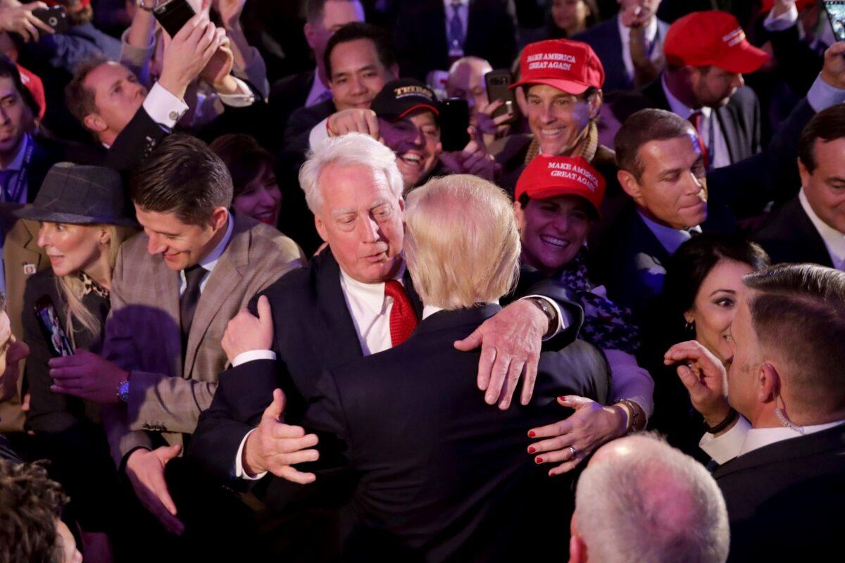 Republican president-elect Donald Trump hugs his brother Robert Trump in New York City on Nov. 9, 2016. (Chip Somodevilla/Getty Images)