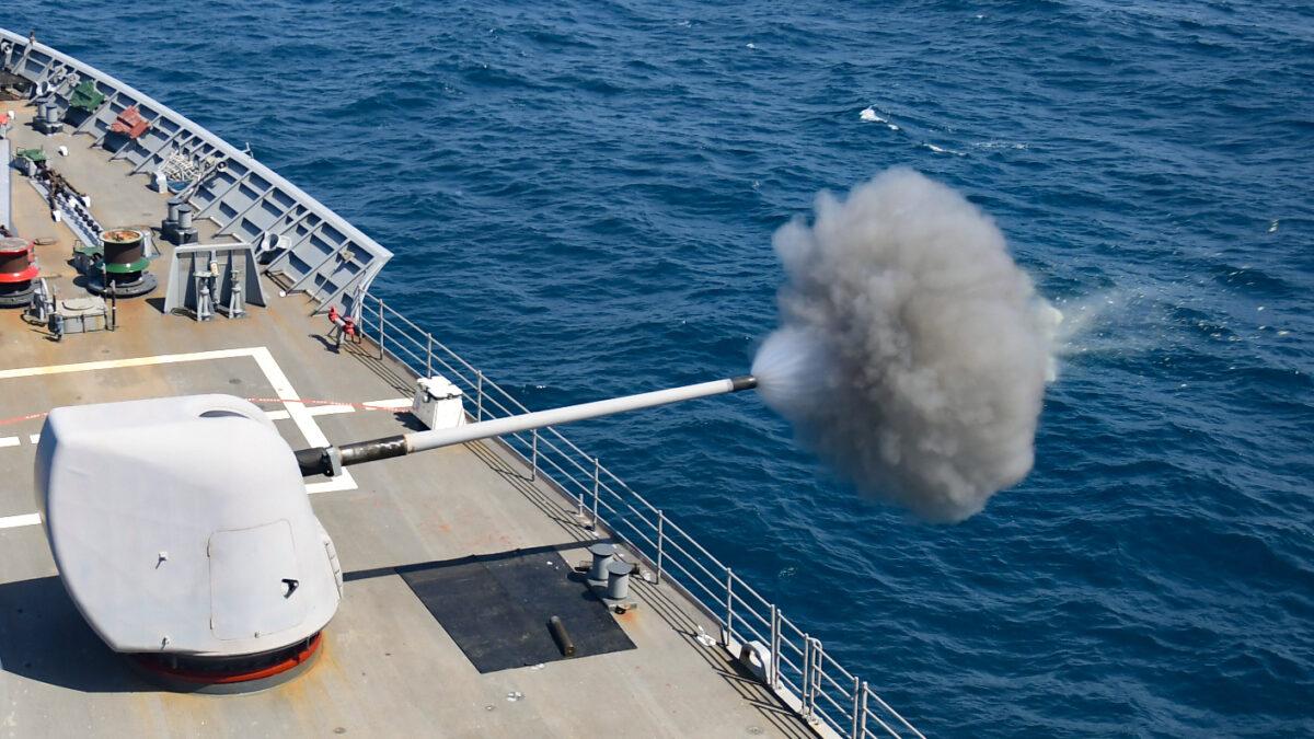 The guided-missile cruiser USS San Jacinto (CG 56) fires its 5-inch gun during a live fire exercise in the Arabian Sea, April 25, 2020. (U.S. Navy Photo by Mass Communication Specialist 2nd Class Maxwell Anderson/Released)