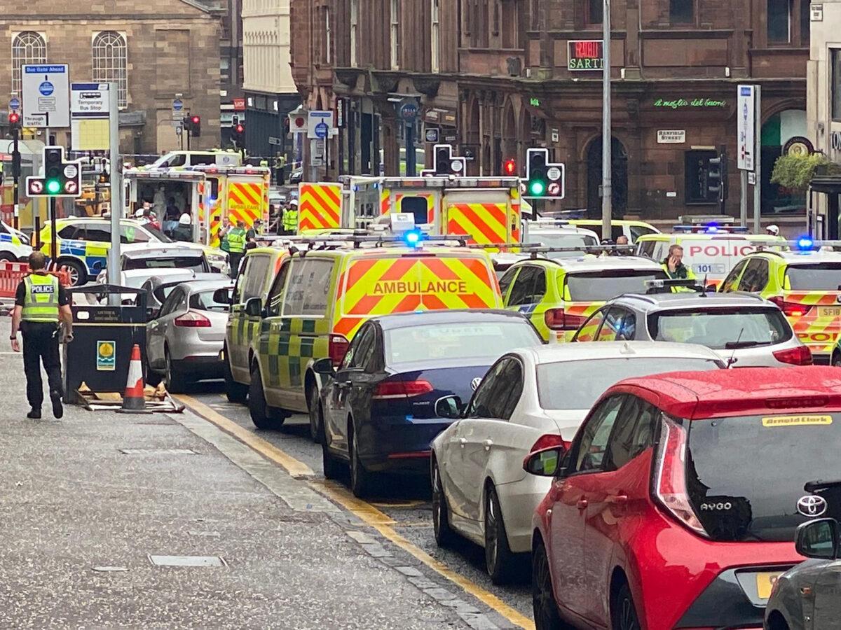 In this picture obtained from social media, emergency responders are seen near a scene of reported stabbings, in Glasgow, Scotland, Britain, on June 26, 2020. (@JATV_Scotland/via Reuters)