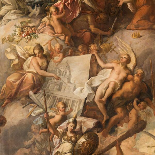 A detail of the painting “The Triumph of Peace and Liberty Over Tyranny” in which the Spirit of Architecture, dressed in gold, points to a drawing of the Painted Hall. At the bottom, the Greek goddess Pallas Athena, decked in armor, looks down in readiness to defend the kingdom from vices. (Old Royal Naval College)