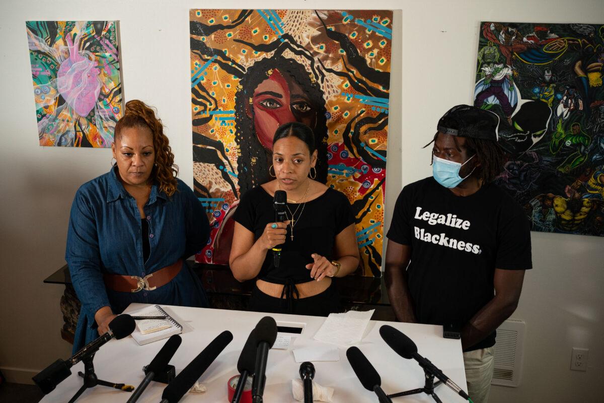 Jesse Miller, her daughter Naudia Miller, and Marcus Henderson, who are organizers within the Capitol Hill Organized Protest (CHOP), speak during a press conference in Seattle, Wash., on June 25, 2020. (David Ryder/Getty Images)