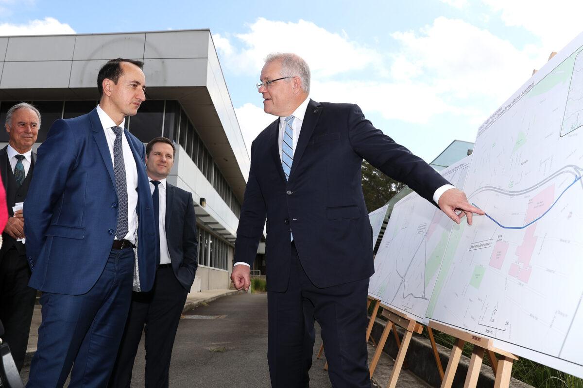 Member for Wentworth Dave Sharma and Prime Minister Scott Morrison discuss the planning maps at an infrastructure announcement in Macquarie Park in Sydney, Australia on June 29, 2020. (Mark Kolbe/Getty Images)