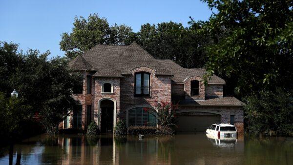 Floodwaters surround a home in Houston, Texas, over a week after Hurricane Harvey hit Southern Texas, on Sept. 6, 2017. (Justin Sullivan/Getty Images)