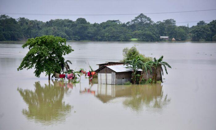 Floods in India’s Assam Force a Million From Their Homes