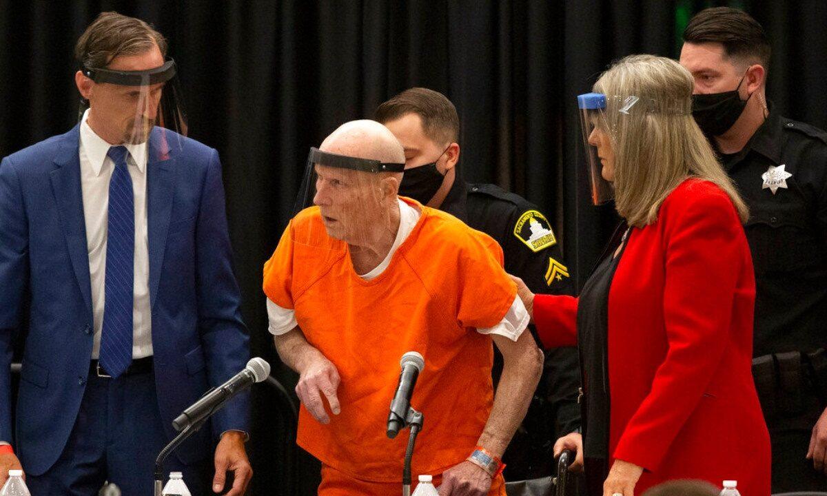 Joseph James DeAngelo (C) charged with being the Golden State Killer, is helped up by his attorney, Diane Howard, as Sacramento Superior Court Judge Michael Bowman enters the courtroom in Sacramento, Calif., on June 29, 2020. (Rich Pedroncelli/AP Photo)