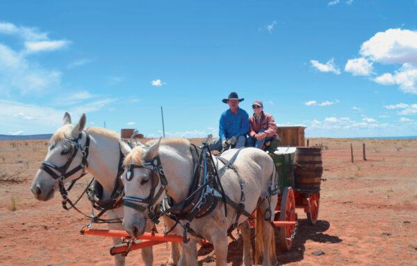 Kent and Shannon Rollins on their chuck wagon. (Stormie Mosimann)