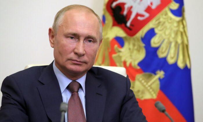 Russian State Exit Polls Show 76 Percent so Far Back Reforms That Could Extend Putin Rule