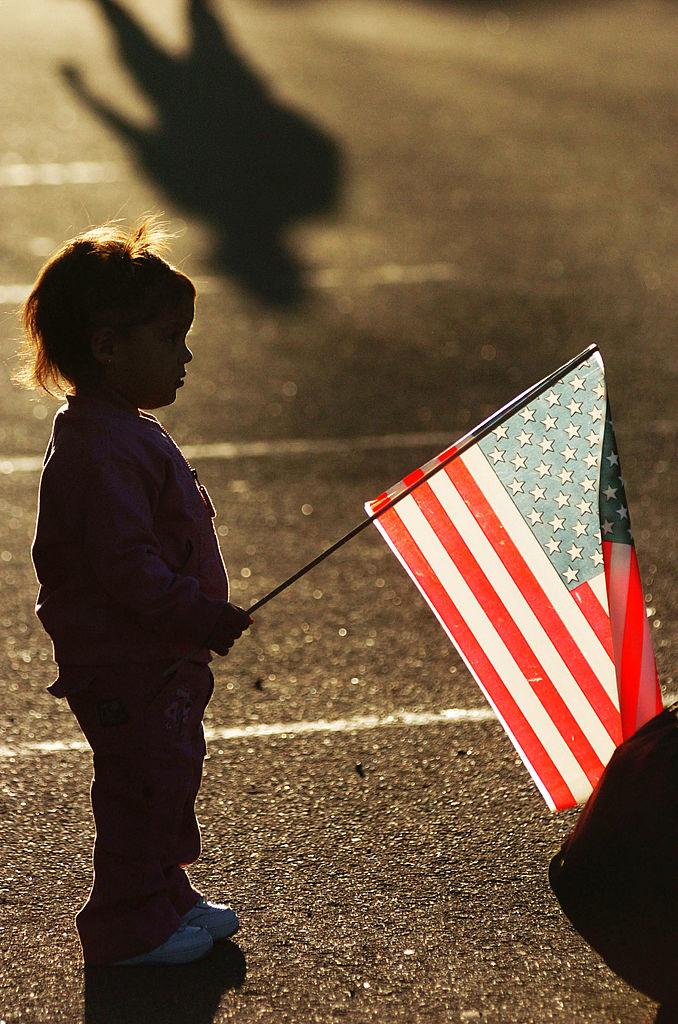 Lizzy Bernardino,18 months, waits for her dad Jose to return during a homecoming ceremony for Marines on September 24, 2004, at Camp Pendleton, Calif. (Sandy Huffaker/Getty Images)