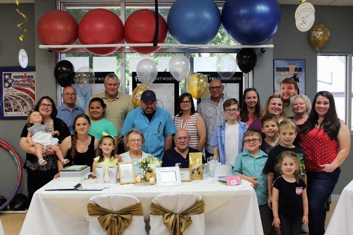 Curtis and Betty on their 50th wedding anniversary with their children, Tricia and Tim, and grandchildren. (Courtesy of <a href="https://www.facebook.com/Tarp9">Tim Tarpley</a>)