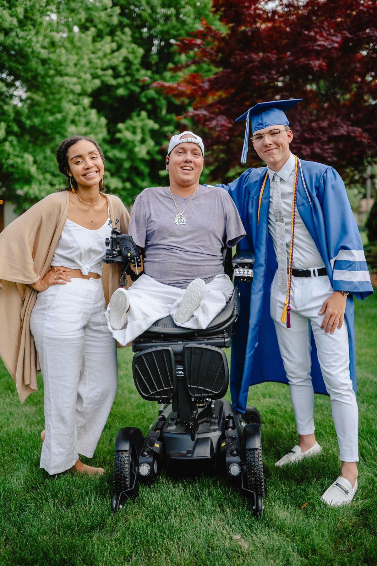 Ryan Hudson-Peralta with daughter Myranda at his son Noah's graduation (Caters News)