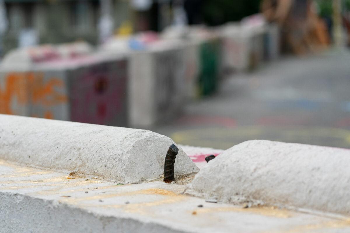 A sawed rebar loop on a concrete barrier, intentionally damaged to make barrier removal difficult, is seen in the area known as the Capitol Hill Organized Protest (CHOP) in Seattle, Wash., on June 29, 2020. (David Ryder/Getty Images)