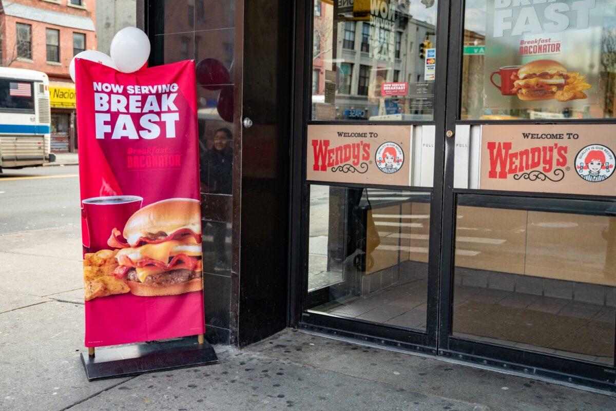 A banner announcing Now Serving Breakfast is shown outside a Wendy's restaurant in New York City, on March 2, 2020. (David Dee Delgado/Getty Images)