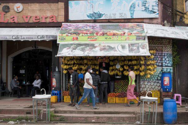 Shoppers are seen outside a grocery store in the Kasanchiz area of Addis Ababa, Ethiopia, on July 1, 2020. (Maheder Haileselassie/Reuters)