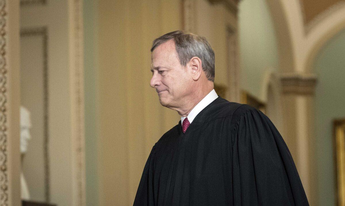 Supreme Court Chief Justice John Roberts arrives to the Senate chamber at the Capitol in Washington on Jan. 16, 2020. (Drew Angerer/Getty Images)